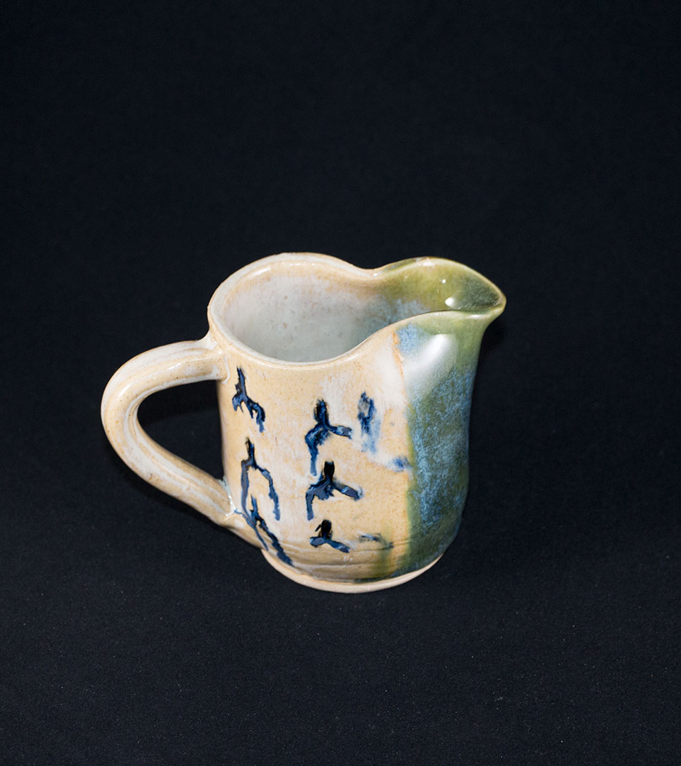 Small Green and Tan Pitcher