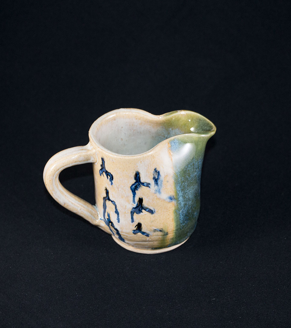 Small Green and Tan Pitcher